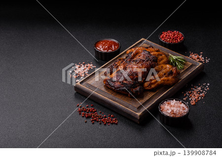 Chicken or turkey, poultry breast baked on the grill or barbecue. Grilled chicken 139908784