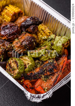 Vegetables such as corn, bell peppers, zucchini, and grilled mushrooms. Grilled vegetables 139908824