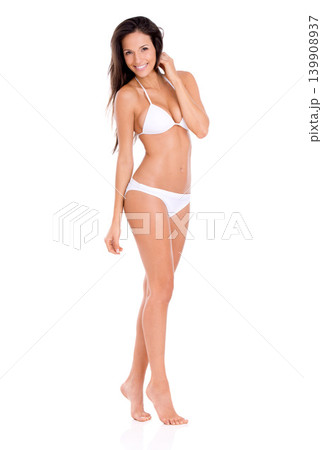 Bikini, fashion and confident portrait of woman in studio, white background and mock up with pride. Happy, model and girl with beauty in underwear for summer, vacation or swimwear style for holiday Bikini, fashion and confident portrait of woman in studio, white background and mock up with pride. Happy, model and girl with beauty in underwear for summer, vacation or swimwear style for holiday 139908937