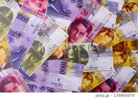 Switzerland, Swiss franc paper money and coins, financing and commodity exchange. Swiss currency Switzerland, Swiss franc paper money and coins, financing and commodity exchange. Swiss currency 139908970