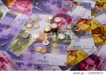 Switzerland, Swiss franc paper money and coins, financing and commodity exchange. Swiss currency Switzerland, Swiss franc paper money and coins, financing and commodity exchange. Swiss currency 139908972