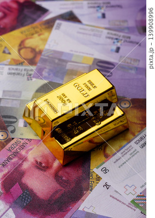 Swiss gold bars or ingots as a tool for balance, financial investment, and savings. Swiss gold bars Swiss gold bars or ingots as a tool for balance, financial investment, and savings. Swiss gold bars 139908996