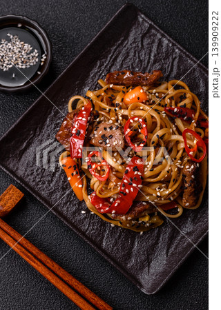 Food, Chinese or Japanese noodles with meat, vegetables, and spices. Noodles with beef 139909222