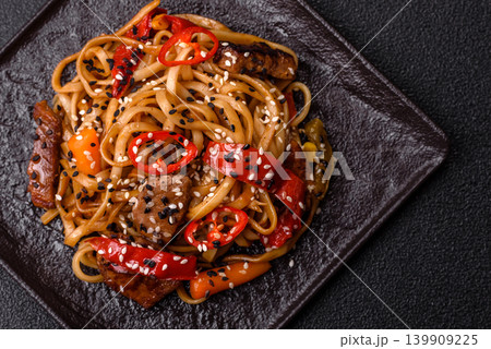 Food, Chinese or Japanese noodles with meat, vegetables, and spices. Noodles with beef Food, Chinese or Japanese noodles with meat, vegetables, and spices. Noodles with beef 139909225