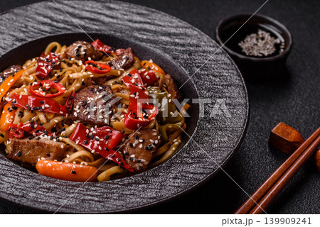 Food, Chinese or Japanese noodles with meat, vegetables, and spices. Noodles with beef 139909241
