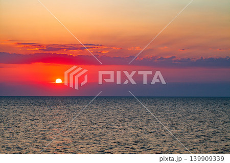 sunset red sun over the sea 139909339