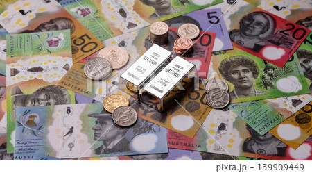 A silver bar, white metal against a backdrop of Swiss flag, as a concept for the sales. A silver bar A silver bar, white metal against a backdrop of Swiss flag, as a concept for the sales. A silver bar 139909449