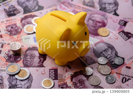 A piggy bank as a concept for storing, accumulating, and saving financial resources. A piggy bank A piggy bank as a concept for storing, accumulating, and saving financial resources. A piggy bank 139909805