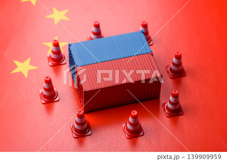 The cargo container ban on the China flag as a conceptual backdrop. The cargo container embargo The cargo container ban on the China flag as a conceptual backdrop. The cargo container embargo 139909959