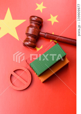 The cargo container ban on the China flag as a conceptual backdrop. The cargo container embargo 139909977