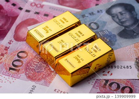 Chinese gold bars or ingots as a tool for balance, financial investment. Chinese gold bars 139909999