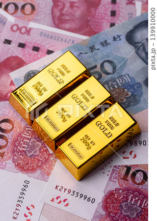 Chinese gold bars or ingots as a tool for balance, financial investment. Chinese gold bars 139910000