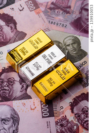 Gold and silver bullion or ingots as metals for bank storage, investments. Gold and silver bars Gold and silver bullion or ingots as metals for bank storage, investments. Gold and silver bars 139910053