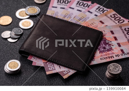 Mexico, Mexican peso, paper money and coins, financing and commodity exchange. Mexican currency Mexico, Mexican peso, paper money and coins, financing and commodity exchange. Mexican currency 139910084