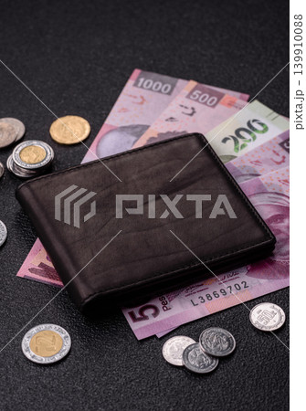 Mexico, Mexican peso, paper money and coins, financing and commodity exchange. Mexican currency Mexico, Mexican peso, paper money and coins, financing and commodity exchange. Mexican currency 139910088