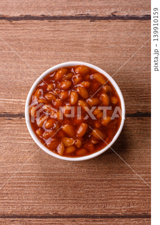 Beans in tomato sauce, a canned stew for the dinner table. Beans in tomato sauce Beans in tomato sauce, a canned stew for the dinner table. Beans in tomato sauce 139910159
