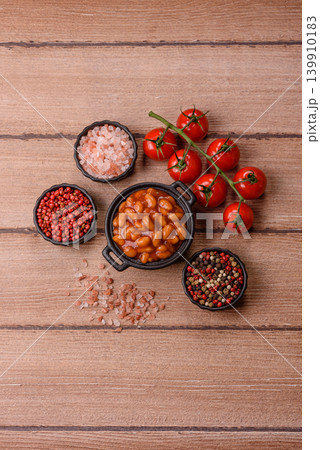 Beans in tomato sauce, a canned stew for the dinner table. Beans in tomato sauce 139910183
