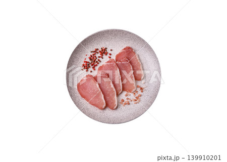 Smoked or dry cured meat slices, pork or ham with salt and spices. Smoked meat slices Smoked or dry cured meat slices, pork or ham with salt and spices. Smoked meat slices 139910201