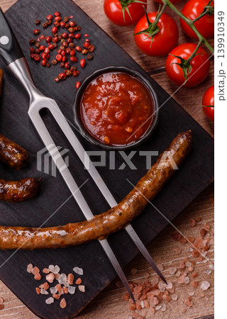 Thin chicken or pork sausages grilled or barbecued. Grilled sausages Thin chicken or pork sausages grilled or barbecued. Grilled sausages 139910349