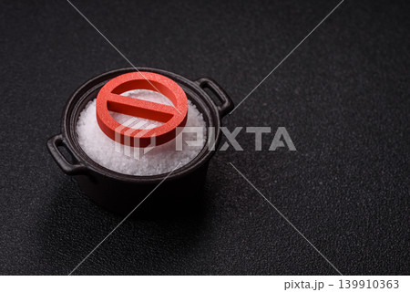 The salt ban sign as a concept to stop the problem of heart attack and pressure. The salt ban sign 139910363