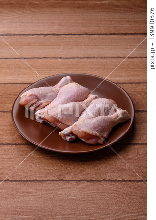 Fresh raw chicken or turkey legs for diet food. Raw chicken legs Fresh raw chicken or turkey legs for diet food. Raw chicken legs 139910376