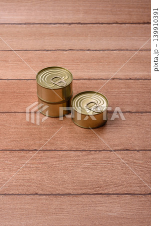 A metal tin can of meat, fish, or dog or cat food. A tin can of food 139910391