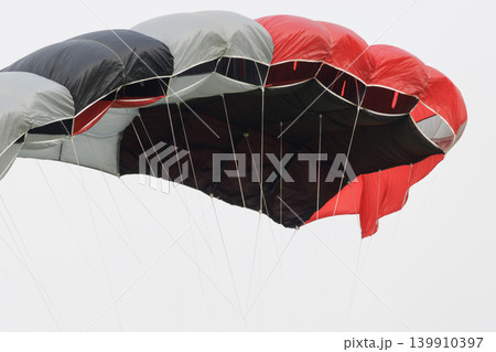 Red, black and white skydiving parachute canopy 139910397