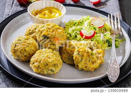 baked meat and vegetable polpette on a plate baked meat and vegetable polpette on a plate 139910489