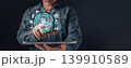 Businessman using tablet with virtual gear interface for business automation. Concept of digital transformation, AI technology, cloud data, finance strategy, and process management. 139910589