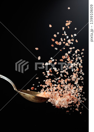 Himalaya salt on a dark background. 139910609