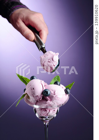 Blueberry ice cream with mint and berries. Blueberry ice cream with mint and berries. 139910620