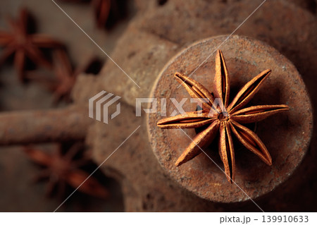 Anise on a rusty background. 139910633