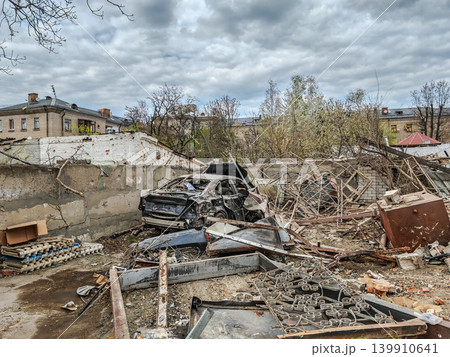 Destroyed car and garages was at epicenter of russian missile explosion Destroyed car and garages was at epicenter of russian missile explosion 139910641