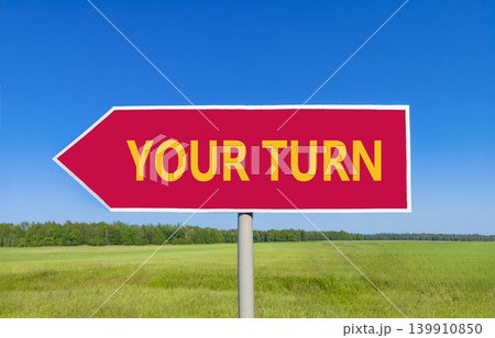 Your turn words symbol. Concept words Your turn on beautiful red road sign. Beautiful blue sky green field background. Business your turn motivational support concept. Copy space. Your turn words symbol. Concept words Your turn on beautiful red road sign. Beautiful blue sky green field background. Business your turn motivational support concept. Copy space. 139910850