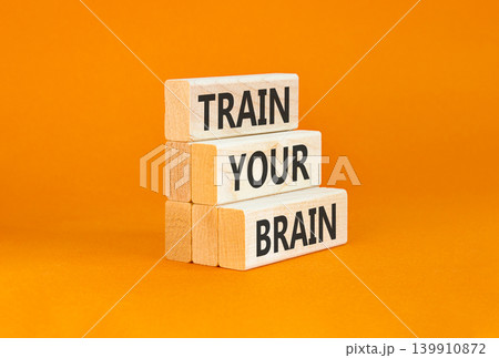 Train your brain words symbol. Concept words Train your brain on beautiful wooden blocks. Beautiful orange background. Business motivational and train your brain concept. Copy space Train your brain words symbol. Concept words Train your brain on beautiful wooden blocks. Beautiful orange background. Business motivational and train your brain concept. Copy space 139910872