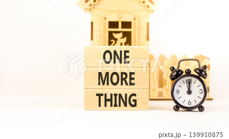 One more thing words symbol. Concept words One more thing on beautiful wooden blocks. Beautiful white background. Black alarm clock. Business and one more thing concept. Copy space. One more thing words symbol. Concept words One more thing on beautiful wooden blocks. Beautiful white background. Black alarm clock. Business and one more thing concept. Copy space. 139910875