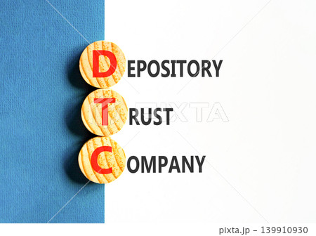 DTC depository trust company symbol. Concept words DTC depository trust company on beautiful wooden circles. Beautiful white blue background. Business DTC depository trust company concept. Copy space. DTC depository trust company symbol. Concept words DTC depository trust company on beautiful wooden circles. Beautiful white blue background. Business DTC depository trust company concept. Copy space. 139910930