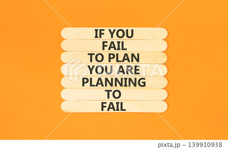 Planning to fail symbol. Concept words If you fail to plan you are planning to fail on beautiful wooden sticks. Beautiful orange paper background. Business planning to fail concept. Copy space. Planning to fail symbol. Concept words If you fail to plan you are planning to fail on beautiful wooden sticks. Beautiful orange paper background. Business planning to fail concept. Copy space. 139910938
