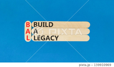 BAL build a legacy symbol. Concept words BAL build a legacy on beautiful wooden sticks. Beautiful blue background. Business BAL build a legacy concept. Copy space BAL build a legacy symbol. Concept words BAL build a legacy on beautiful wooden sticks. Beautiful blue background. Business BAL build a legacy concept. Copy space 139910969