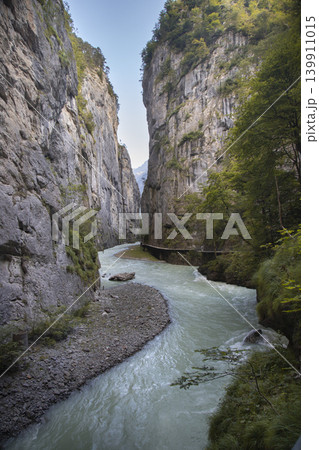 Aare gorge river flowing through narrow canyon Aare gorge river flowing through narrow canyon 139911015