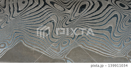 Macro surface of the Damascus steel blade Macro surface of the Damascus steel blade 139911034