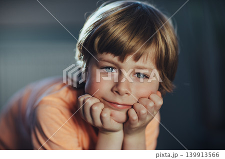 Portrait of cute thoughtful boy Portrait of cute thoughtful boy 139913566