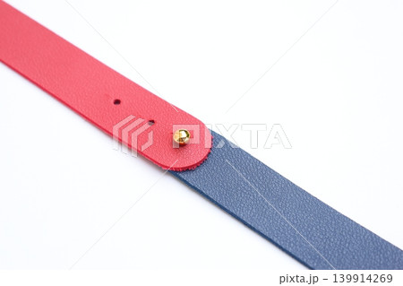 dark blue and red leather strap isolated on white background 139914269