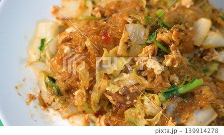 stir fried sukiyaki with egg and pork on white plate stir fried sukiyaki with egg and pork on white plate 139914278