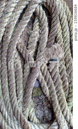 Top View Coiled Thick Old Marine Hemp Rope on Ground 139916684