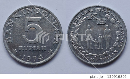 Old Indonesian 5 Rupiah coin from 1974 with the Family Planning symbol. Old Indonesian 5 Rupiah coin from 1974 with the Family Planning symbol. 139916893