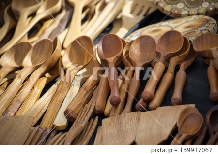 Close up of various wooden kitchen utensils, perfect for cooking and serving. 139917067