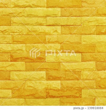 Golden yellow brick wall texture with vintage style pattern for background and design art work. Golden yellow brick wall texture with vintage style pattern for background and design art work. 139918084
