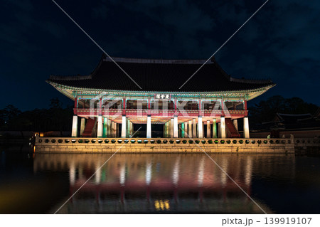 Seoul, South Korea - May. 14, 2026 : Magnificent night view of Gyeonghoeru Pavilion reflected in the pond during the spring night opening at Gyeongbokgung Palace, Seoul Seoul, South Korea - May. 14, 2026 : Magnificent night view of Gyeonghoeru Pavilion reflected in the pond during the spring night opening at Gyeongbokgung Palace, Seoul 139919107
