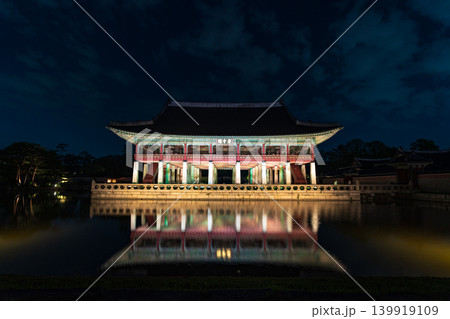Seoul, South Korea - May. 14, 2026 : Magnificent night view of Gyeonghoeru Pavilion reflected in the pond during the spring night opening at Gyeongbokgung Palace, Seoul 139919109